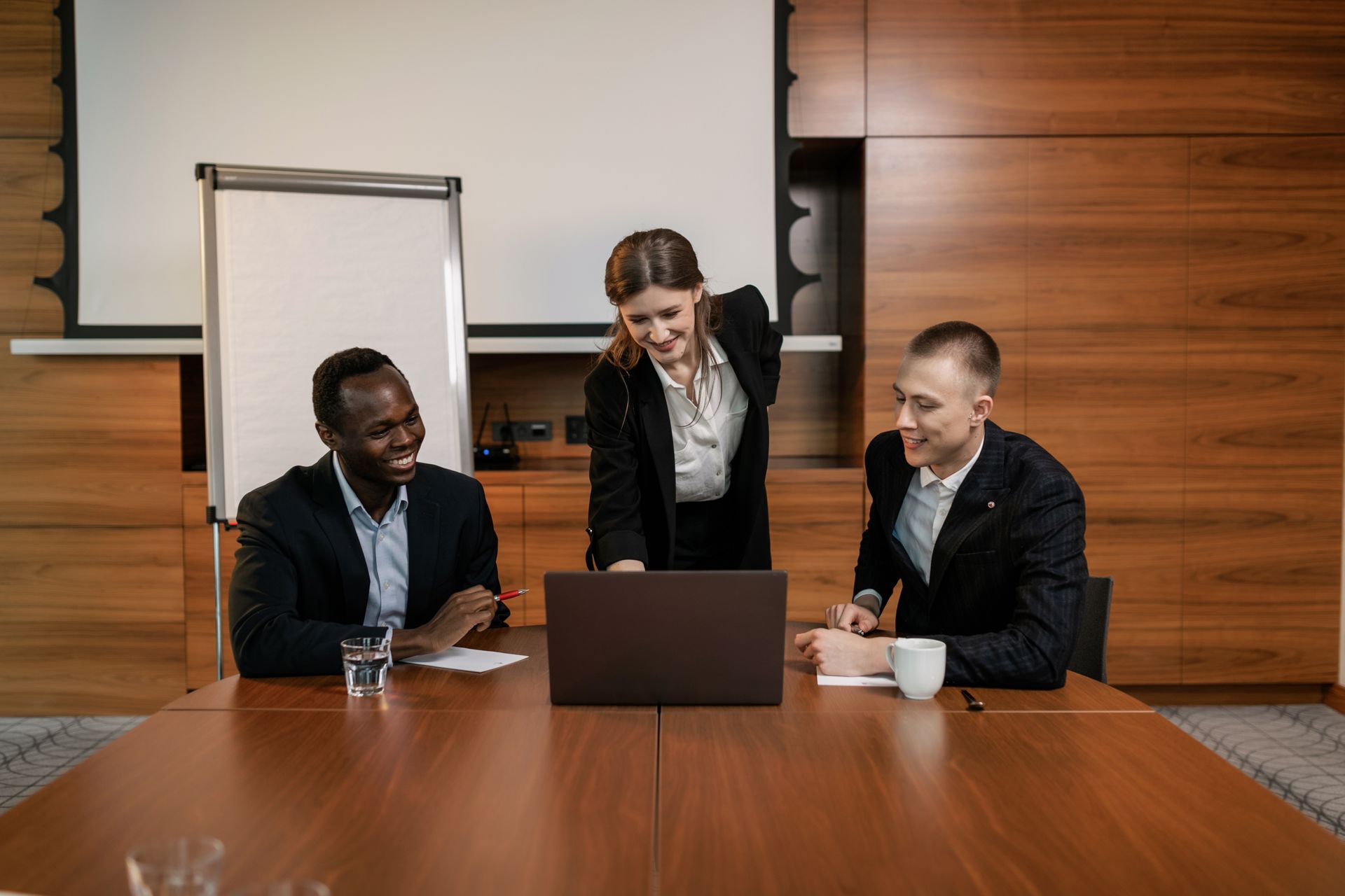 leader confidently presenting to a room